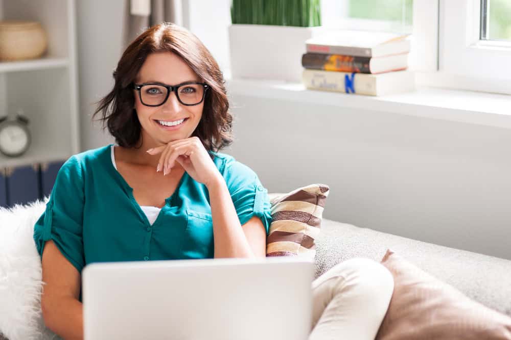 Woman at home during telehealth addiction treatment in Washington recovery journey